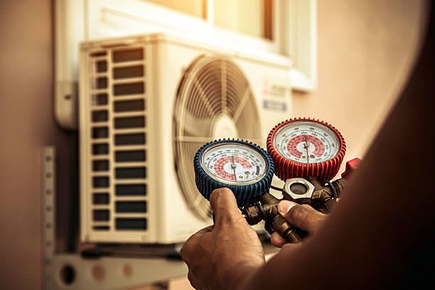 Professional Heat Pump Repair technician working in Castaic, CA